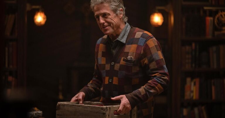 iconic sweaters hugh grant in the heretic 1